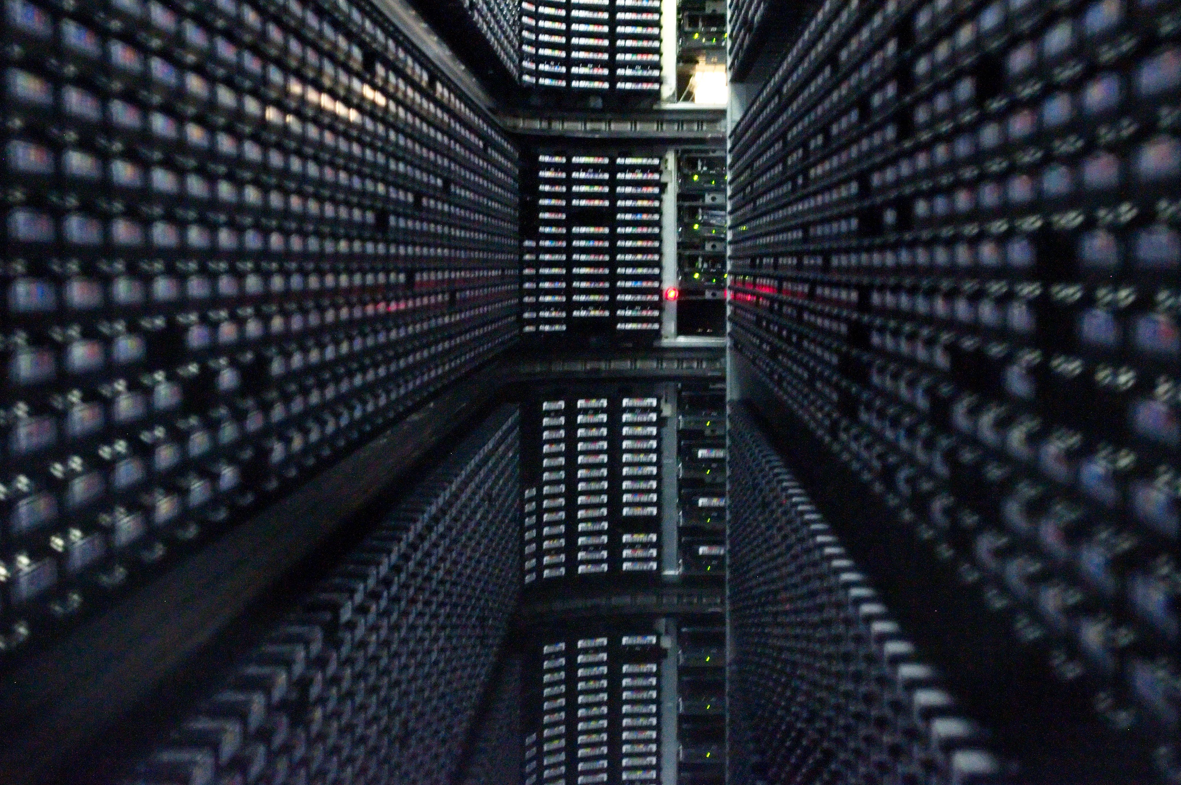 Rows of tape cartridges inside a StorageTek tape library at NERSC.
