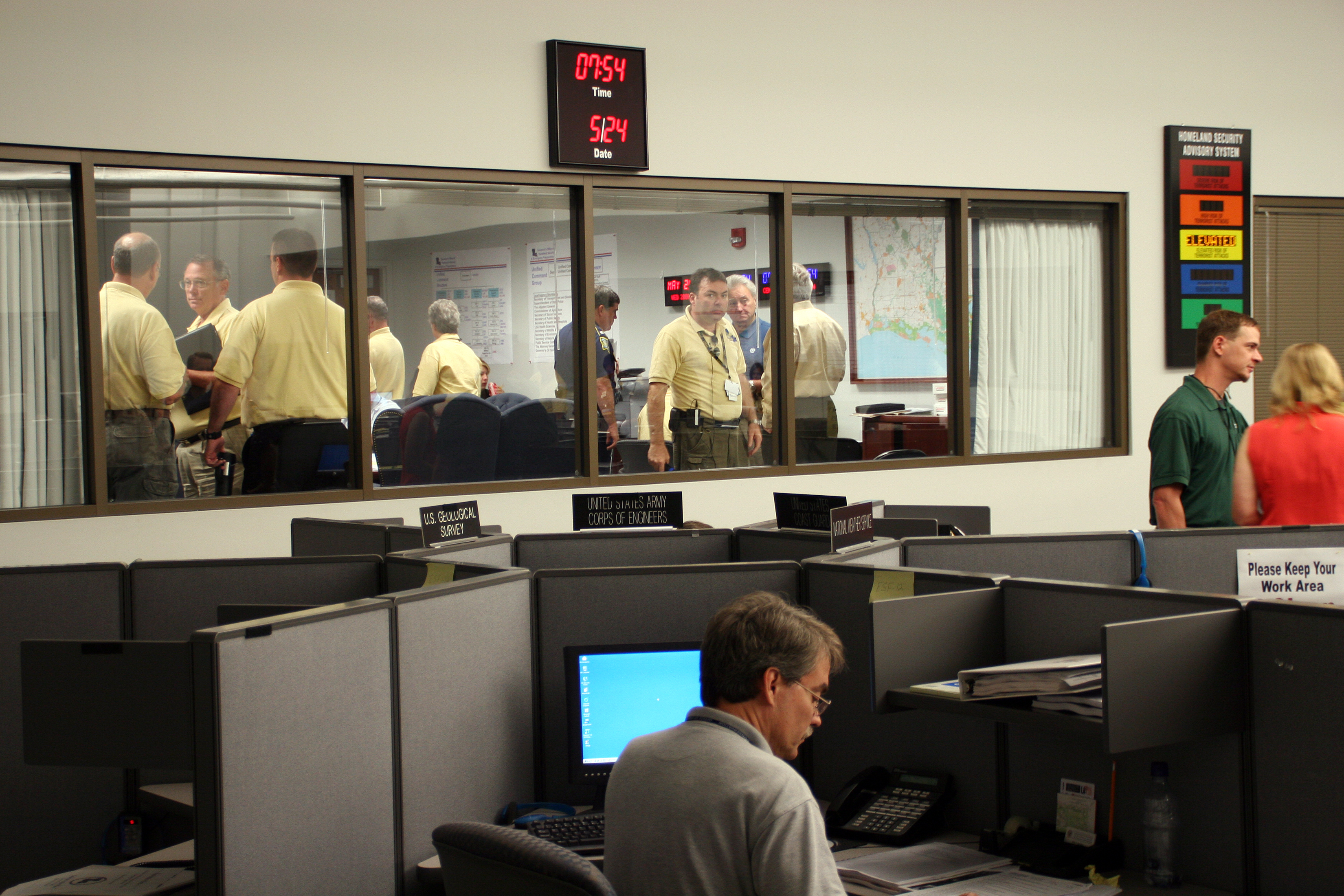Officials coordinating a hurricane-response exercise in the Louisiana State Emergency Operations Center.
